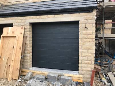 RYTERNA mid ribbed sectional garage door in Anthracite Grey 
